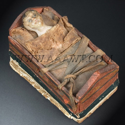 Antique Squeak Toy, Infant in Cradle, Painted, Circa 1830, angle view
